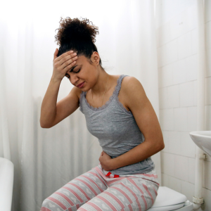 Woman experiencing constipation